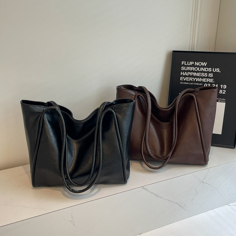 Black and brown soft PU leather tote bag color comparison