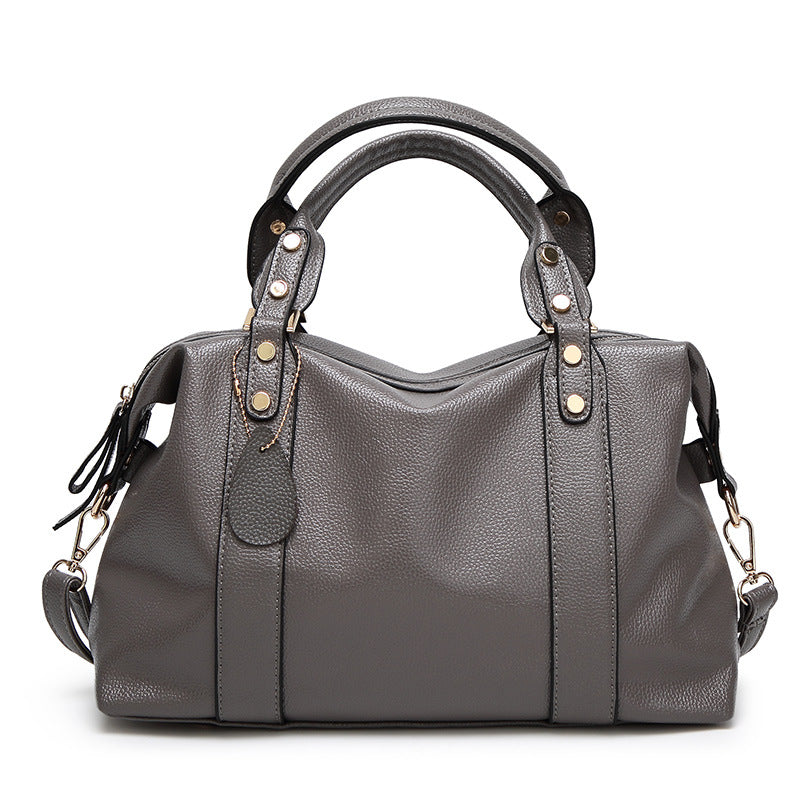 Retro Rivet Cowhide Boston Shoulder Bag — product image 2