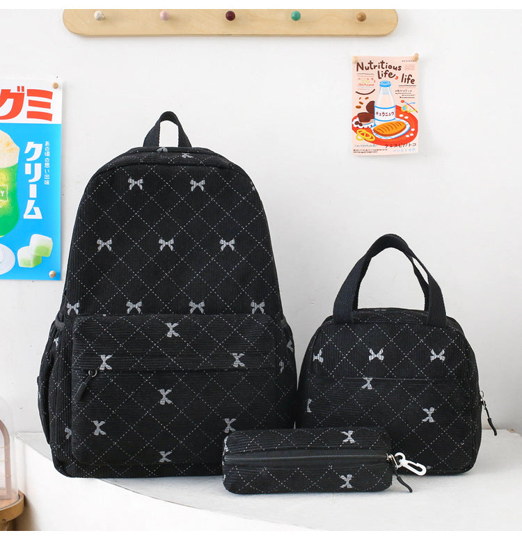 Black quilted bow-print three-piece backpack set with tote and pencil case