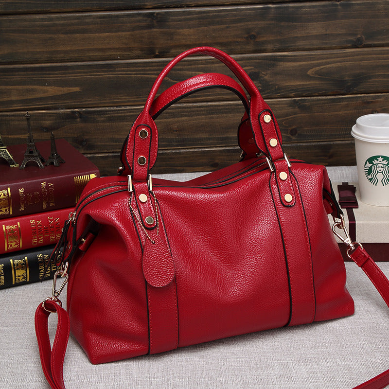 Retro Rivet Cowhide Boston Shoulder Bag — product image 1